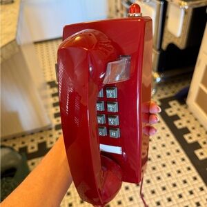 Vintage-Style Red Wall Phone with Push Buttons and long cord.